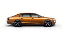 Side view of an orange Bentley Flying Spur W12 S | Bentley Motors